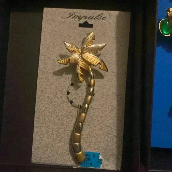 Mixed silver and gold palm tree brooches - Picture 1 of 1